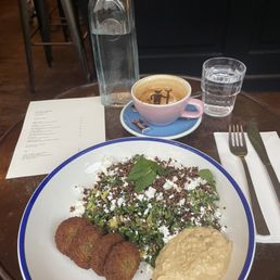 Falafel salad and cappuccino. Falafel salad and cappuccino.