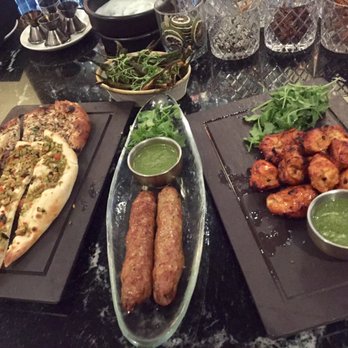 Karma Modern Indian - Olive and mushroom naan, okra, chicken and lamb appetizers - Indian Near Me - Washington, DC, District of Columbia Karma Modern Indian - Olive and mushroom naan, okra, chicken and lamb appetizers - Indian Near Me - Washington, DC, District of Columbia
