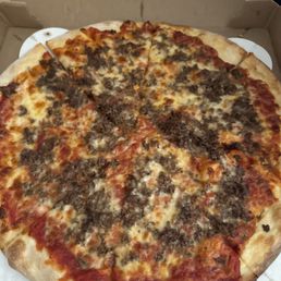 This is a picture of a large steak pizza. This is a picture of a large steak pizza.