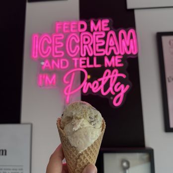 A La Mode Dessert & Ice Cream - Ice cream cone in front of neon sign inside the shop - Ice Cream & Frozen Yogurt Near Me - Southington, Connecticut A La Mode Dessert & Ice Cream - Ice cream cone in front of neon sign inside the shop - Ice Cream & Frozen Yogurt Near Me - Southington, Connecticut