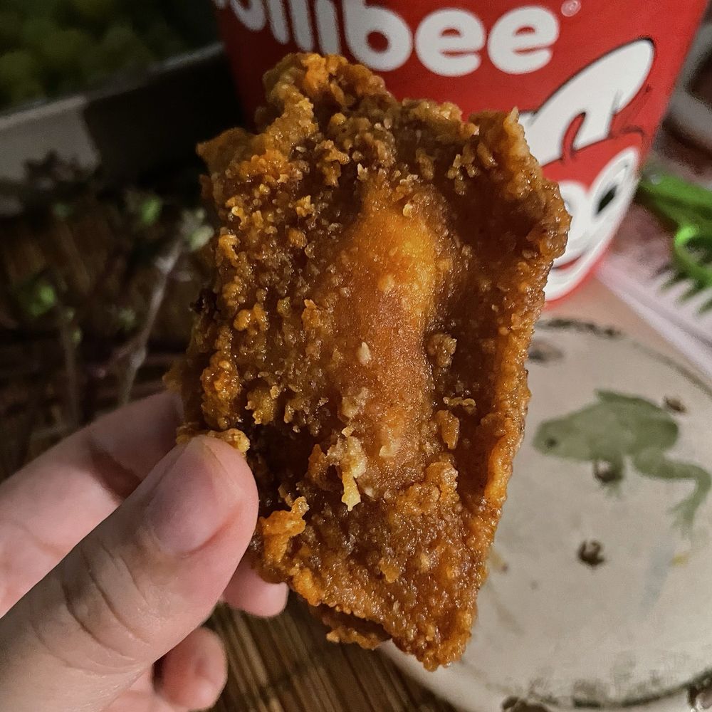 Jollibee - half of a thigh fried chicken - 12pc Chickenjoy Meal Deal - Filipino Near Me - West Covina, California Jollibee - half of a thigh fried chicken - 12pc Chickenjoy Meal Deal - Filipino Near Me - West Covina, California