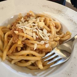 Don Beta - Pichi with sausage and marinara sauce. Light and lovely