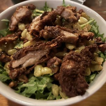 Story Tavern - Arugula salad with hand-breaded fried chicken - Burgers Near Me - Burbank, California Story Tavern - Arugula salad with hand-breaded fried chicken - Burgers Near Me - Burbank, California