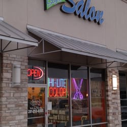 D Style Salon - South of WalMart, on 249/2920