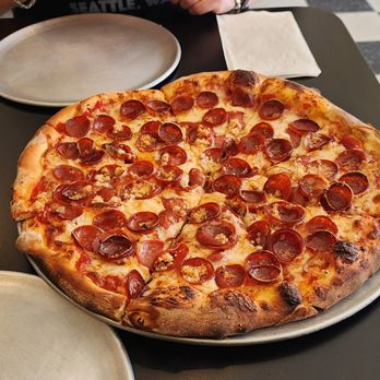 Wicked Pies - 14" Double pepperoni with minced garlic. - Pizza Near Me - Olympia, Washington Wicked Pies - 14" Double pepperoni with minced garlic. - Pizza Near Me - Olympia, Washington