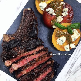 Ambitious Cuisine - Bone-In Ribeye with Heirloom Tomatoes - Personal Chefs Near Me