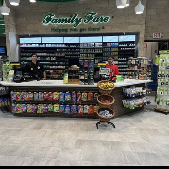 bp - a man standing at a counter in a grocery store - Gas Stations Near Me - Durham, North Carolina