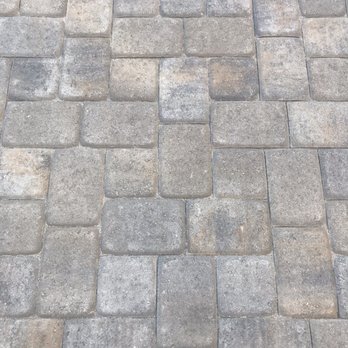 Ocean Pavers - a close up view of a cobblestone sidewalk - Masonry/Concrete Near Me - Aliso Viejo, California