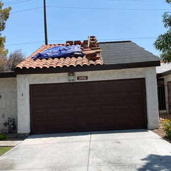 Enigma 1 Solutions - the roof of a house with a tarp on top - General Contractors Near Me - North Las Vegas, Nevada Enigma 1 Solutions - the roof of a house with a tarp on top - General Contractors Near Me - North Las Vegas, Nevada