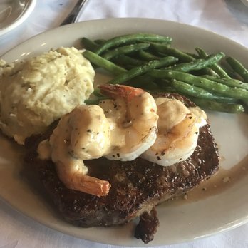 Edgar's - New York strip with shrimp and of course mashed potatoes and green beans - American Near Me - Geneva, New York Edgar's - New York strip with shrimp and of course mashed potatoes and green beans - American Near Me - Geneva, New York