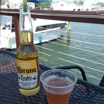 The Nautical Mile - Drinks on the outside deck of Tropix...very bad French martini, but great view of the water. - Local Flavor Near Me - Freeport, New York