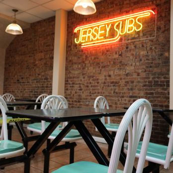Jersey Subs - tables and chairs in a restaurant - Delis Near Me - New Brunswick, New Jersey