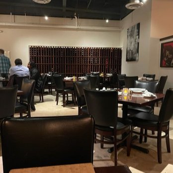 Steak + Vine - Dining area low tops - Steakhouses Near Me - La Grange, Illinois