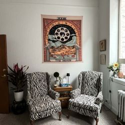 Moon Hypnosis - The zebra chairs in the Moon Hypnosis office, with the Moon tapestry above