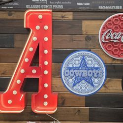 Arby's - Arbys wall decor, w/ soda, sports symbols.