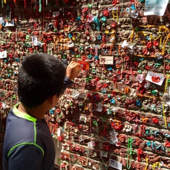 The Gum Wall - Finding a spot so he doesn't touch anyone else's chewed up gum! Oh lawd! - Local Flavor Near Me - Seattle, Washington