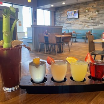 Broken Yolk Cafe - Look at those beauties! Mimosa flight and a Bloody Mary - Breakfast & Brunch Near Me - Costa Mesa, California