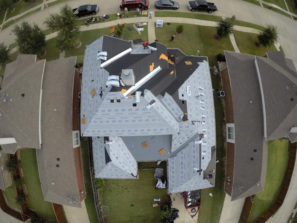 Slide of Texas Roofing and Construction