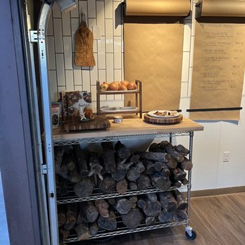 Ciao Down - a rack of firewood in a kitchen - Food Trucks Near Me - Tucson, Arizona
