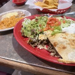 El Dos de Oros - Steak stuffed quesadilla, Spanish rice and beans