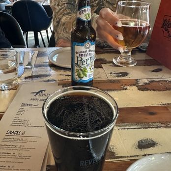 Revelry - The Vienna Lager with the pear cider in the background. - Wine Bars Near Me - Bozeman, Montana Revelry - The Vienna Lager with the pear cider in the background. - Wine Bars Near Me - Bozeman, Montana