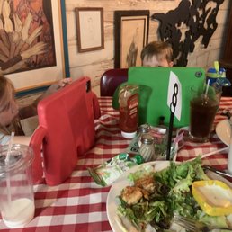 two children eating at a restaurant two children eating at a restaurant