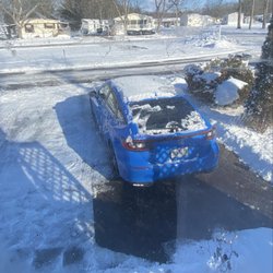 Prime Cut - My car and driveway released from the refrozen snow pack that happened over the last two days.
