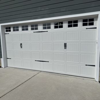 Garage Door Master - From damaged to like new! We replaced this damaged garage door with a beautiful new one, giving this home a fresh look. - Garage Door Services Near Me Garage Door Master - From damaged to like new! We replaced this damaged garage door with a beautiful new one, giving this home a fresh look. - Garage Door Services Near Me