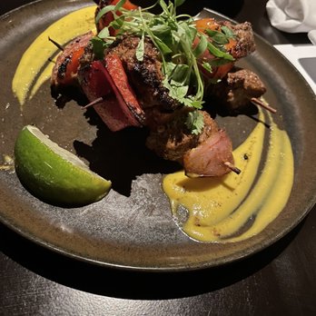 C Level - Marinated filet mignon skewers was cooked perfectly medium rare and seasoning. Love the yellow dipping sauce that came with it! - New American Near Me - San Diego, California
