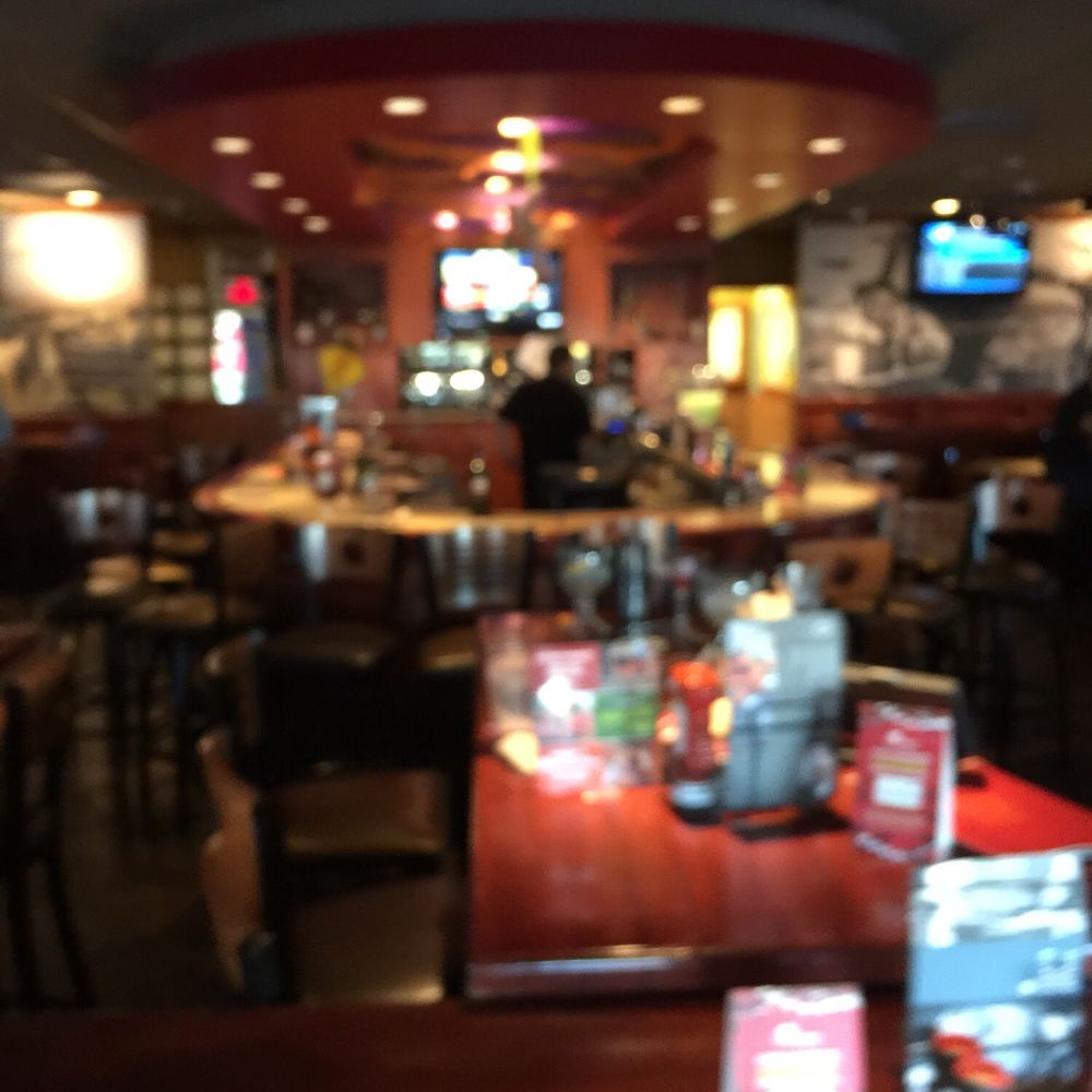 Applebee's Grill + Bar - Bar area. 6 TV sets around the restaurant. Lots of people watching the World Series. It's nice because it's not intrusive for diners either. - American Near Me - El Centro, California