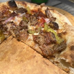 Scot's Pizza - The "Tex-Italian"
Texas Brisket on a Neapolitan Style crust. 
Italian with Spurs on!