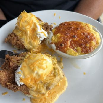 Herschel's Scratch Kitchen - Fried chicken egg Benedict with cheesy grits. Amazing! - Breakfast & Brunch Near Me - New Port Richey, Florida Herschel's Scratch Kitchen - Fried chicken egg Benedict with cheesy grits. Amazing! - Breakfast & Brunch Near Me - New Port Richey, Florida
