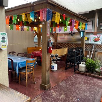 El Rinconcito - a patio with tables and chairs - Mexican Near Me - Hollister, California