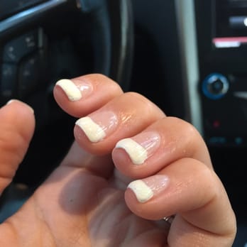 The Nails Center - You can see where the edges are uneven and the old yellow-tinted clear polish doesn't even cover it all. - Nail Salons Near Me - Simi Valley, California
