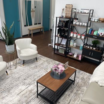 Amore Wax & Wellness - Waiting area stocked with all your self care needs. - Waxing Near Me - The Colony, Texas