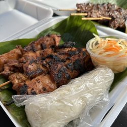 Khin Khao - Khin khao lemongrass chicken skewers with sticky rice side of pickled papaya/carrots (pop up food stand in Lakewood CA