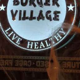 Exterior outside entrance of Burger Village - Advertisement - Hicksville, New York Exterior outside entrance of Burger Village - Advertisement - Hicksville, New York