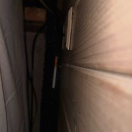 Dirty behind bed