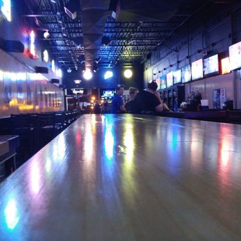 Famous Joe's Tavern - a long wooden bar - Sports Bars Near Me - Wilmington, Delaware