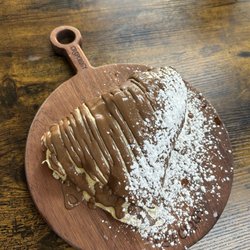 Crepology - Crepe with Nutella sauce, vanilla bean creme, stuffed with strawberries and bananas