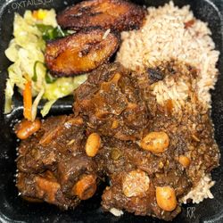 Choice Carribean Market - Oxtails n' Gravy with peas & rice + cabbage and plantains.
