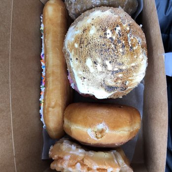 Donut Drop - Left to right- blueberry, Nutella s'mores, Boston cream, old fashioned, and vanilla long john - Donuts Near Me - Schaumburg, Illinois