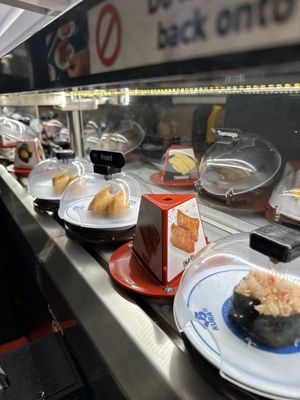 Kura Revolving Sushi Bar by null