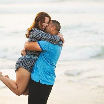 Jalea Photography - Engaged couple being playful at Mission Beach, San Diego - Event Photography Near Me