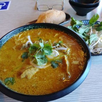 Pho Kitchen - Chicken Curry with vermicelli noodles and added a baguette on the side. - Vietnamese Near Me - San Diego, California Pho Kitchen - Chicken Curry with vermicelli noodles and added a baguette on the side. - Vietnamese Near Me - San Diego, California