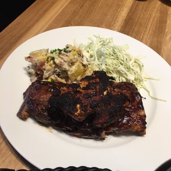 Earls Kitchen + Bar - The half of ribs and chicken with cole slaw and warm potato salad; I WANT MORE LOL. - New American Near Me - McLean, Virginia Earls Kitchen + Bar - The half of ribs and chicken with cole slaw and warm potato salad; I WANT MORE LOL. - New American Near Me - McLean, Virginia