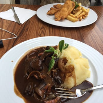 Hanácká Hospoda - Beef cheek in foreground; fried chicken in back - Czech Near Me - Olomouc, OL