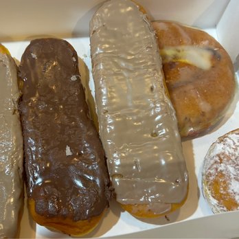 Andeez Donuts - Longjohns, raspberry cream filled donut & cinnamon roll beneath the maple longjohn. - Donuts Near Me - Edmond, Oklahoma Andeez Donuts - Longjohns, raspberry cream filled donut & cinnamon roll beneath the maple longjohn. - Donuts Near Me - Edmond, Oklahoma