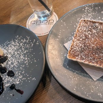Chop Steakhouse & Bar - Cheesecake with blueberry compote & passion fruit Creme Brulee - Steakhouses Near Me - Ottawa, Ontario