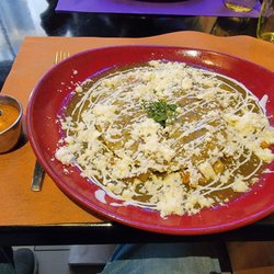 Maguey - Enchilada in green sauce. Mildly spicier than the red one. But good spicy  The side hot sauce that I asked for was a pleasant surprise!